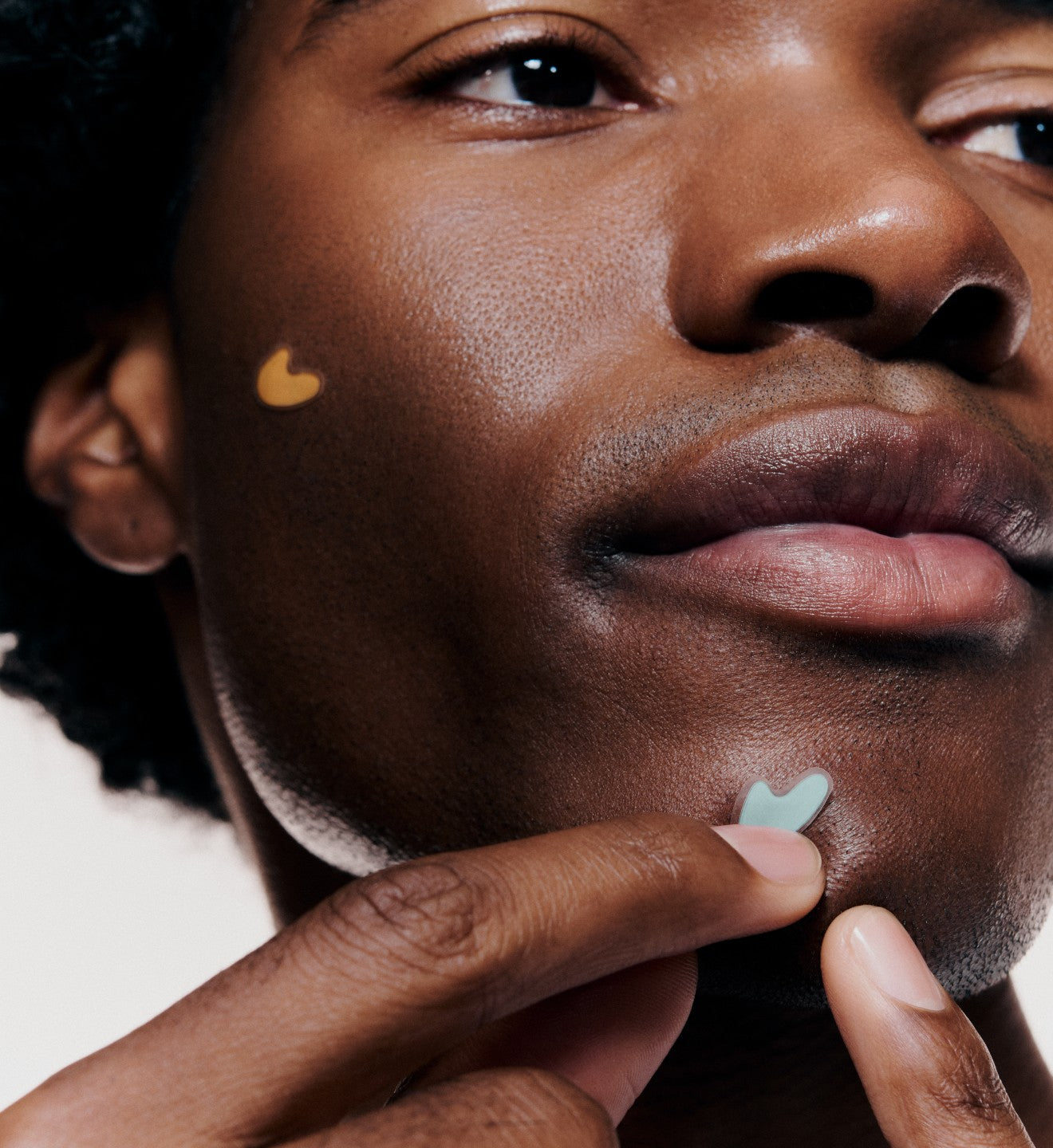 Person applying a Spotwear sticker